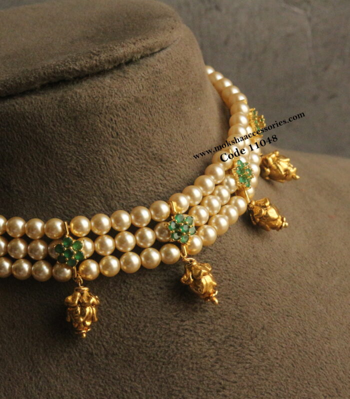 CZ emerald stone pendants with sarvoski pearl choker