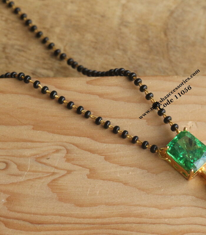 Russian stone pendant with black beads