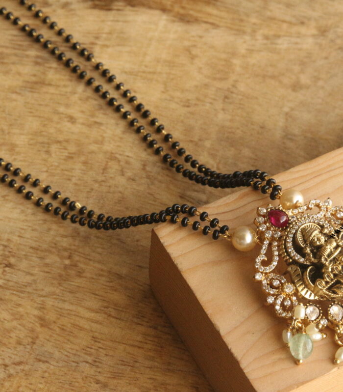 Nakshi lakshmi devi ruby stone pendant with black beads