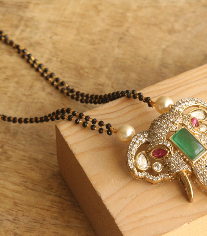 CZ elephant pendant with black beads