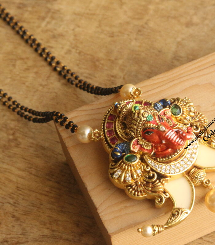 Ganesh pendant with black beads