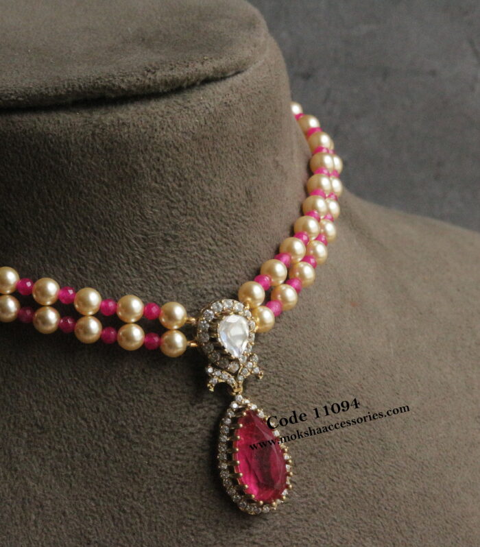 Mozonite stone pendant with sarvoski pearls and ruby beads