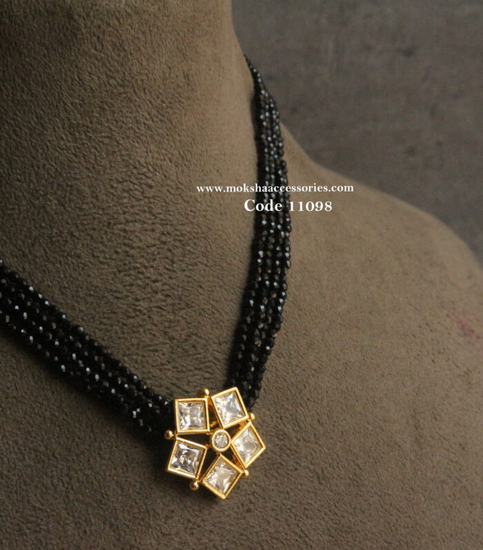 CZ pendant with black beads