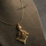 Gold Hasli with Nakshi Pendant