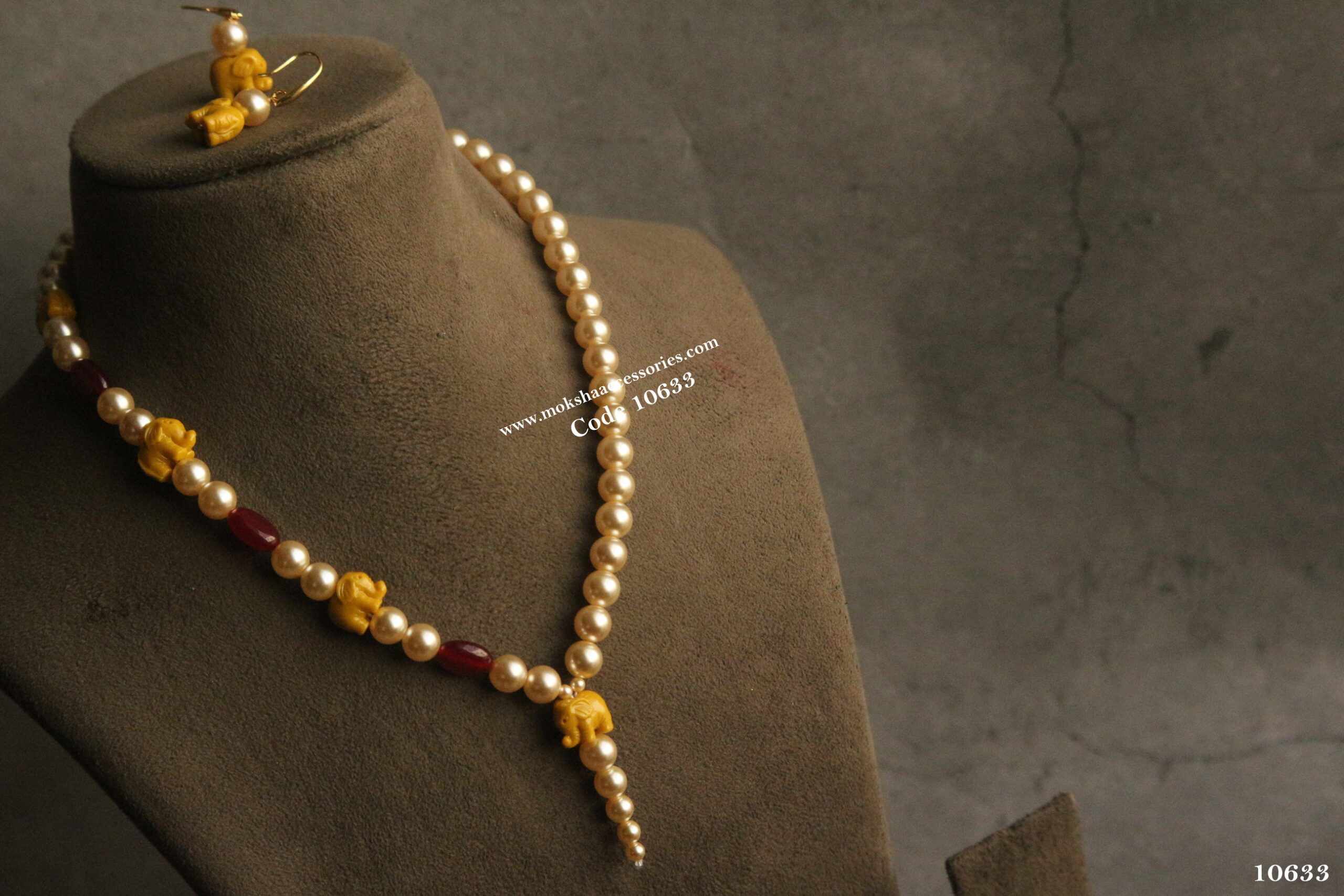 10633-scaled-1.jpg Elephants with Swarovski Pearls and Onyx Ruby Beads - Image 1