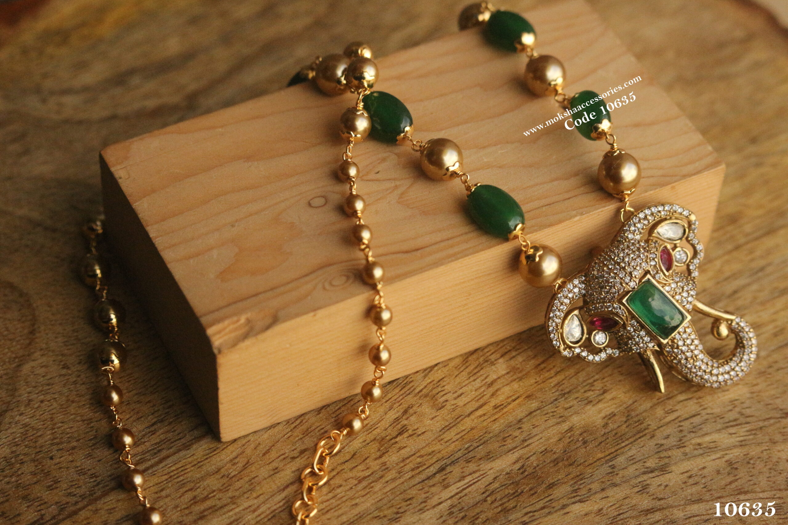 10635-scaled-1.jpg CZ Elephant Pendant with Gold Swarovski Pearls and Onyx Beads - Image 1