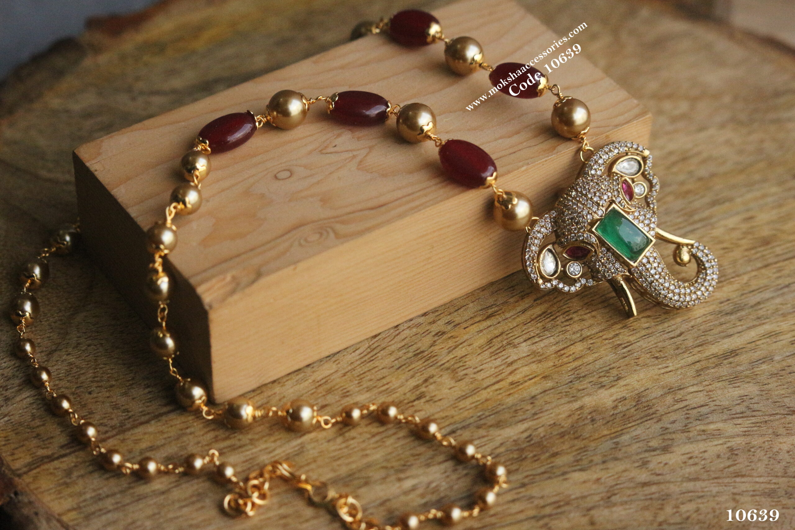 10639-scaled-1.jpg CZ Elephant Pendant with Gold Swarovski Pearls and Onyx Beads - Image 1