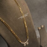 Diamond Alike Pendant Set with Black Beads and Gold Chain Haram (22 Inches Length)