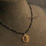 Kasu Pendant with Black Beads and Gold Balls