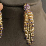 CZ Purple Stone Jhumki with Pearl Chain and Onyx Drops