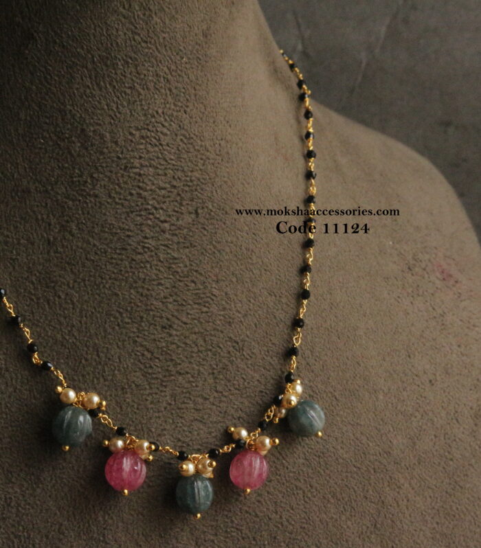 Real pumpkin beads with black beads and sarvoski pearls
