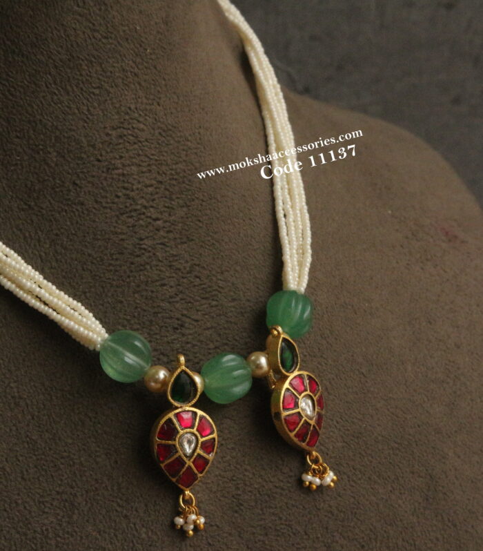 Jadaukundan pendants with pearl chain and pumpkin beads