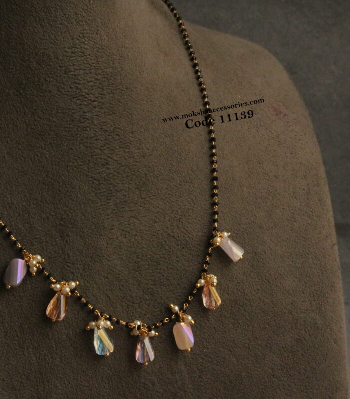 Black beads with fancy drops and pearls