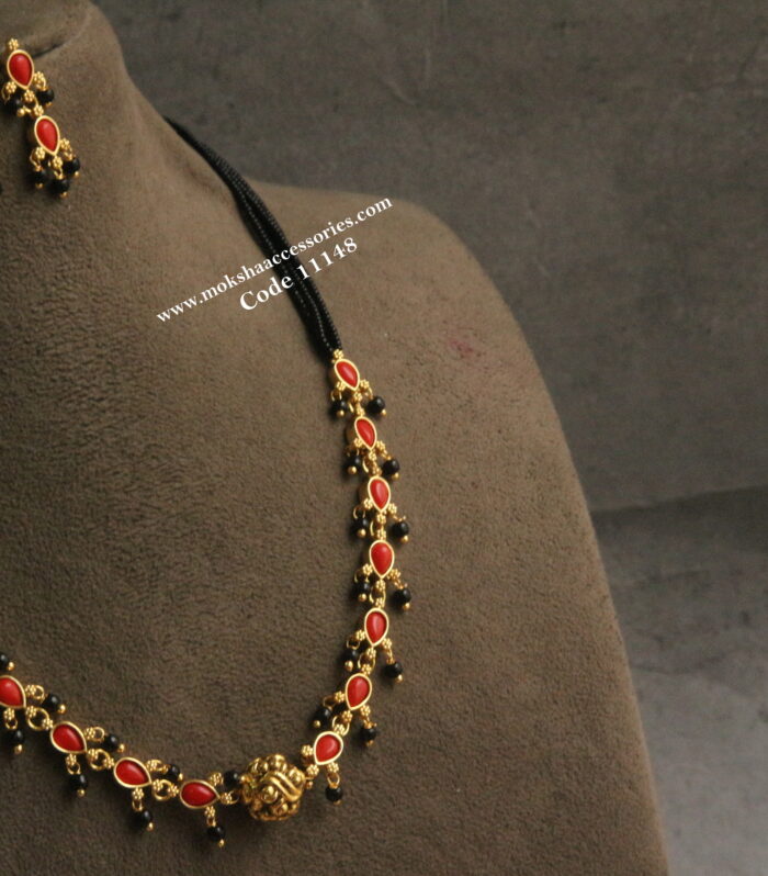 Corals neckset with black beads and nakshi ball