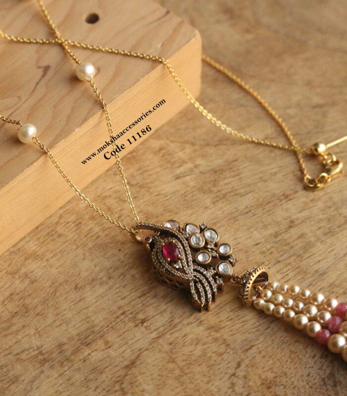 CZ and mozonite stone pendant with gold chain and sarvoski pearls