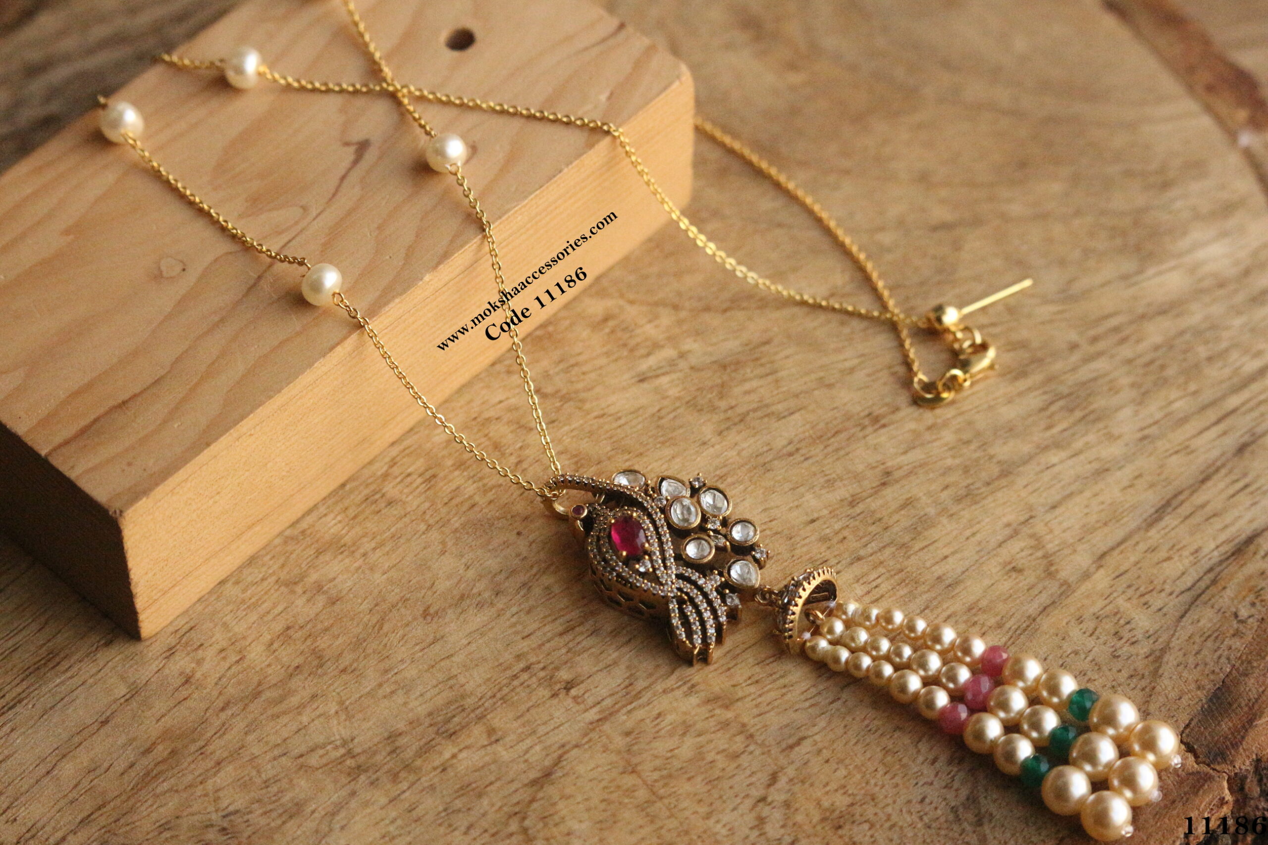 11186-scaled-1.jpg CZ and Mozonite Stone Pendant with Gold Chain and Swarovski Pearls - Image 1