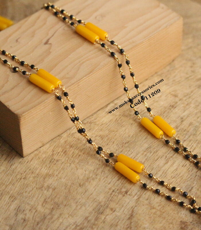 Black beads with yellow onyx