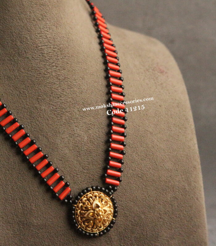 Nakshi pendant with corals and black beads mala