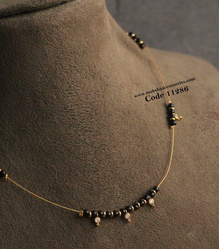 Invisible chain with black beads and cz pendants