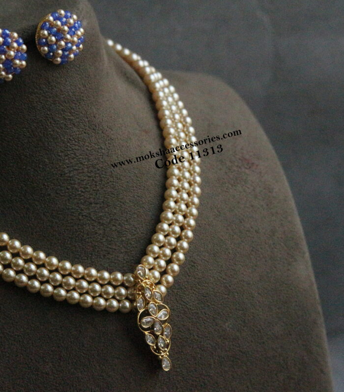 CZ necklace with sarvoski pearls and studs