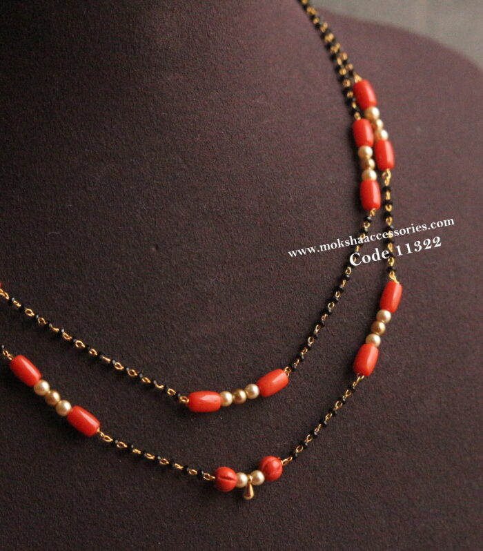 Black beads with corals and sarvoski pearls