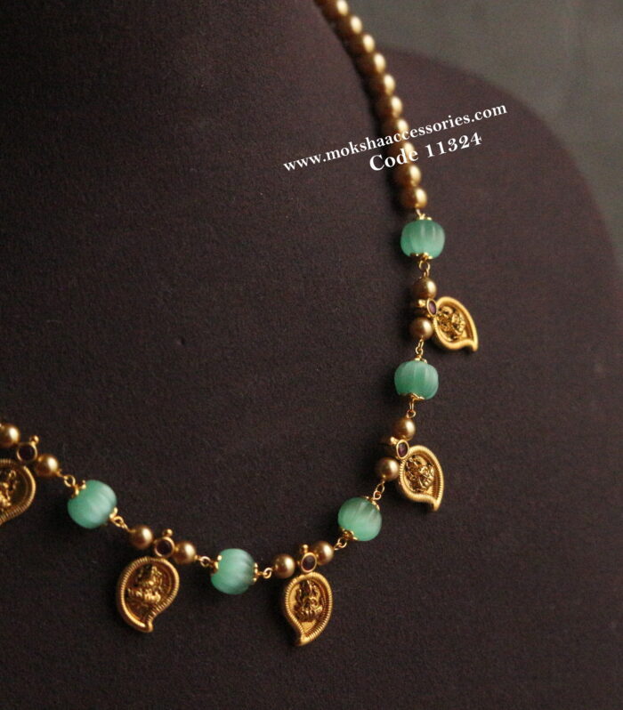 Real russian pumpkin beads with mango pendants and sarvoski pearls