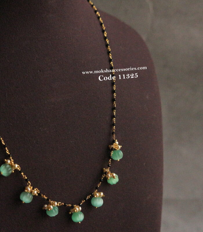 Black beads with real russian pumpkin beads and sarvoski pearls
