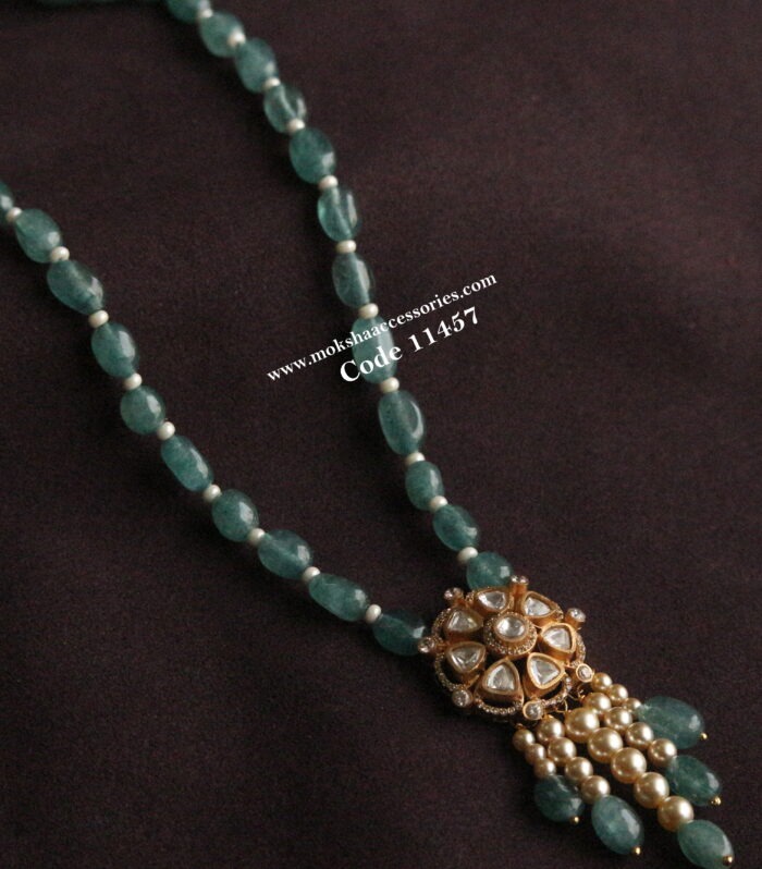 Mozonite stone pendant with onyx blue beads and pearls