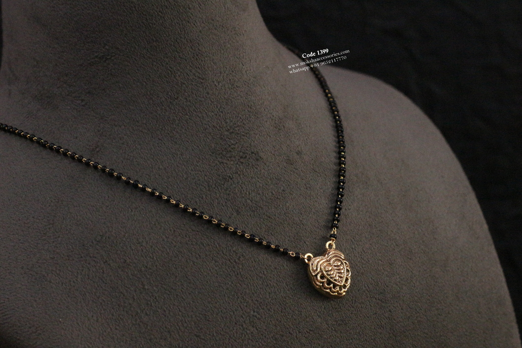 1399.jpg Black Beads with Antique Pendant - Image 1