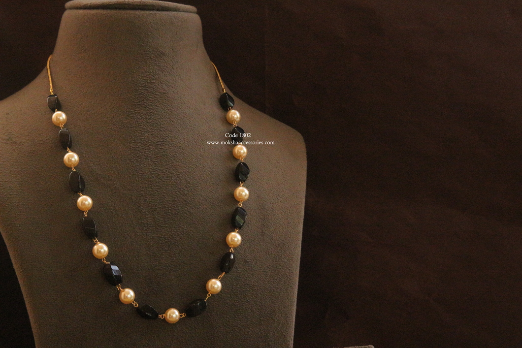 1802.jpg Black Beads with Swarovski Pearl - Image 1