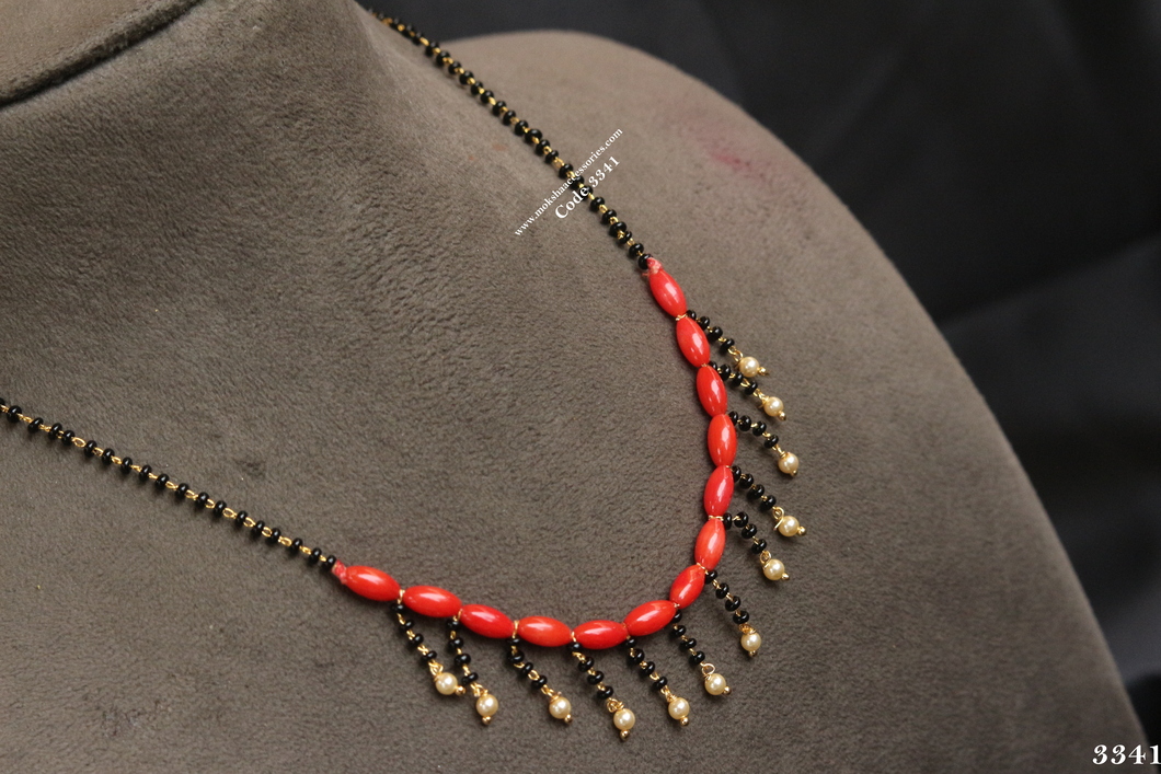 3341.jpg Black Beads with Coral - Image 1