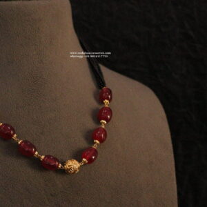 Black Beads with Ruby and Gold Drop