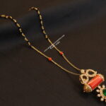 Black Beads with Coral Pendant