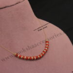 Invisible Chain with Coral Beads and CZ Rings