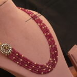 Krishna Pendant with Pink Beads and Antique Gold Balls