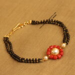 Black Beads and Coral Pendant Bracelet