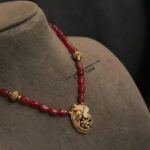 Ruby Beads with Ganesh Pendant