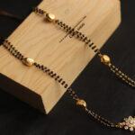 Diamond Alike Pendant with Black Beads and Gold Balls