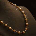 Pearl Mala with Gold Balls